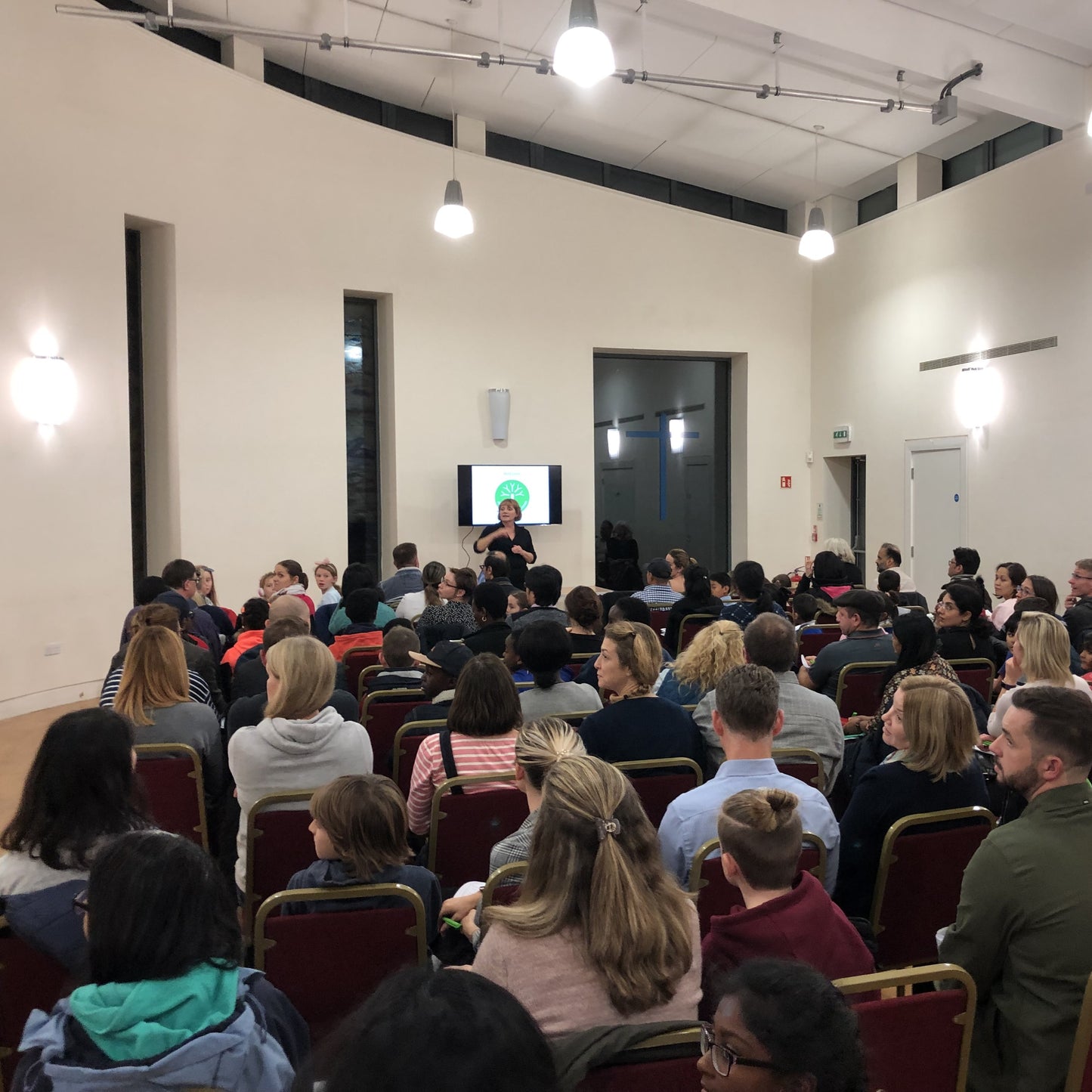 An image showing Jacqui Robinson hosting an information evening for parents on the 11 plus