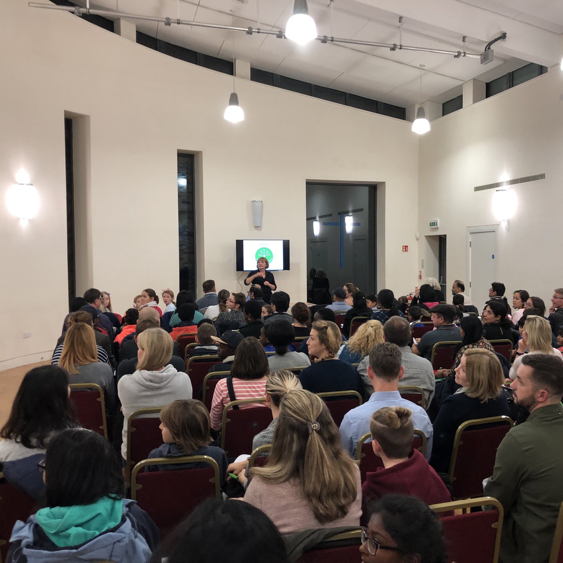 An image showing Jacqui Robinson hosting an information evening for parents on the 11 plus